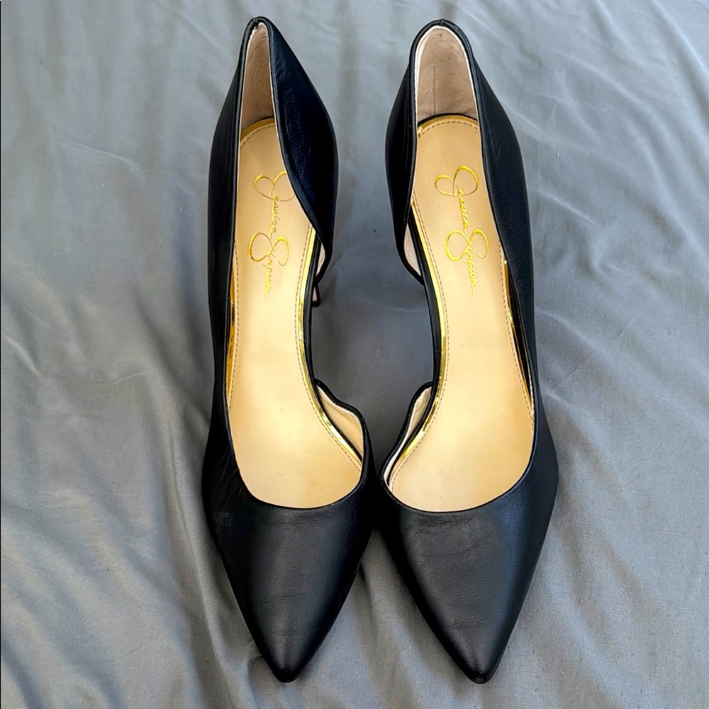 Jessica Simpson, size 12 leather black, opened inside heel.
